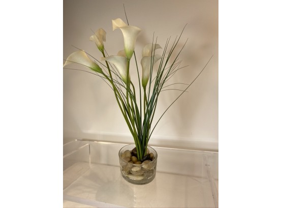 Faux Lillies In Rocks And A Low Glass Vase Bowl