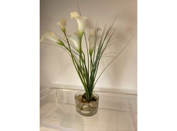Faux Lillies In Rocks And A Low Glass Vase Bowl