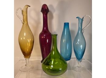 Assortment Of Colored Glass Bottles