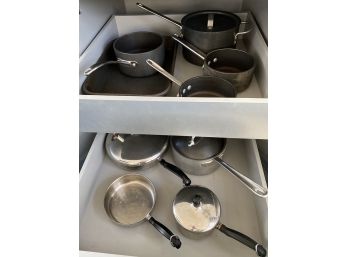 Selection Of Stove Top Pots And Pans And A Baking Dish