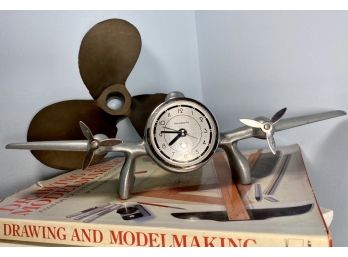 Sasparilla Quatrz Clock With A Heavy Brass Propellor And A Hardcover Book