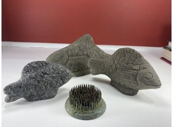 Three Stone Fish And A Metal Flower Frog