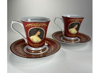 EQ - Two 24 KT Gold Plated Porcelain Cups With Saucers