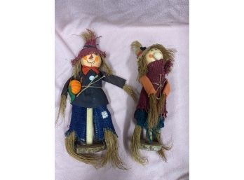 Two Scarecrow Figures