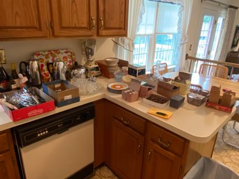 Large Lot Of Items On Kitchen Counter
