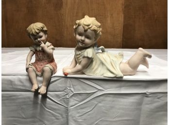2 Antique Bisque Porcelain Piano Baby Figurines