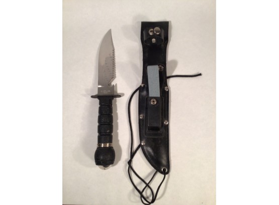 Great Condition Survival Knife With Faux Leather Sheath. Includes Kit