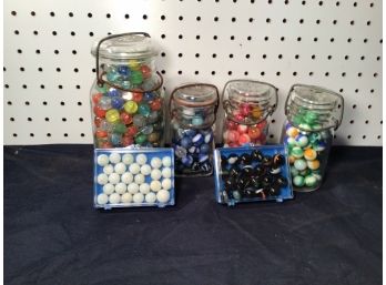 Lot Of 6 Containers Of Marbles, 4 Canning Jars And 2 Plastic Cases