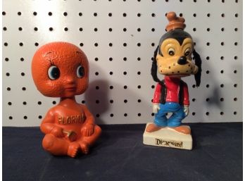 Two Vintage Bobble Heads, Good Condition Disney Goofy And Florida Orange Baby