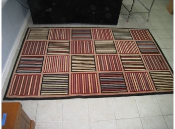 Boldly Colored Squares And Stripes Area Rug