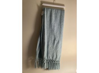 Snuggle Up With This Cozy Teal Throw
