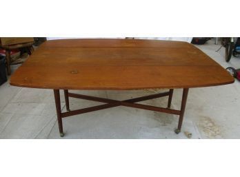 The Long And Skinny Drop Leaf Table Can Fit Many