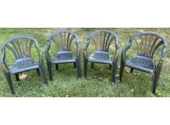 In This Heat We'll Sit This One Out...Set Of 4 Hunter Green Plastic Outdoor Chairs