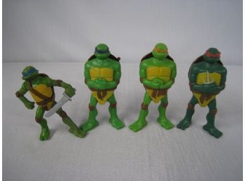 4 Ninja Turtle Figurines