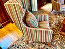 Wingback Sitting Chair In A Striped Pattern