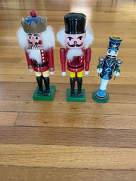 Pair Of Nutcrackers And A Nutcracker Candle Holder