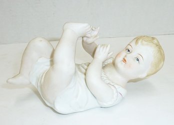 Vintage Porcelain Piano Baby