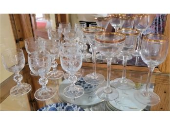 Two Set Of Glasses In China Cabinet (foyer)