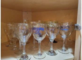 Lot Of Wine Glasses Plus A Few Other Drinking Glasses(Kitchen Shelf Lot)
