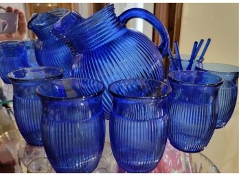 Blue Pitcher With 6 Glasses And Blue Stirs (foyer)
