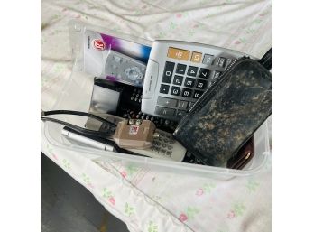Calculator And Remote Control Bin Lot (Dining Room)