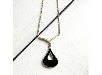 Gold Tone Necklace With Black/Ivory Enamel Pendant