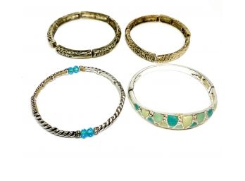 Set Of Four Silver Tone Stretch Bracelets