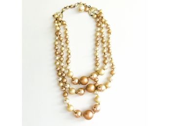 Ivory Toned Multi-strand Pearl Necklace