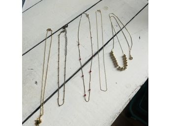 Set Of Five Gold Tone Necklaces