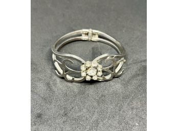 Silver Tone Cuff Bracelet With Center Rhinestone Flower
