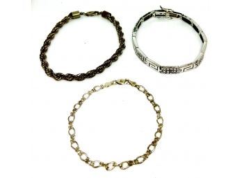 Set Of Three Silver Tone Bracelets