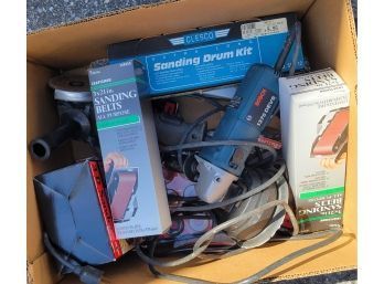 Box Of Sanding Supplies And Sander