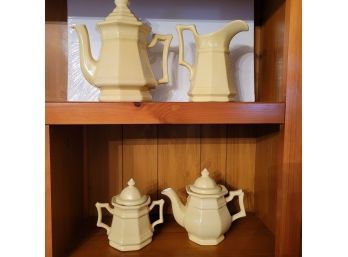 Set Of 2 Pale Yellow Teapots Plus Creamer And Sugar