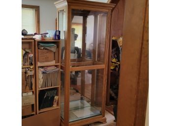 Lighted Wooden Cabinet With Glass Shelving