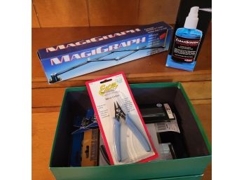 Small Box Of Xacto Knives, Screen Cleaner And Other Small Tools