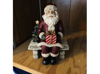 Decorative Santa On Bench (Bedroom 2)