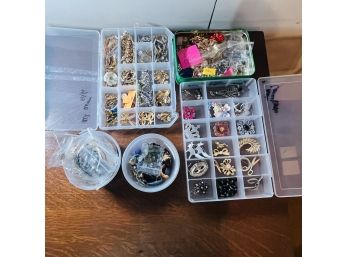 Pins, Broaches, And Bracelets Lot - Costume Jewelry  - In 4 Plastic Storage Containers And One Green Tin
