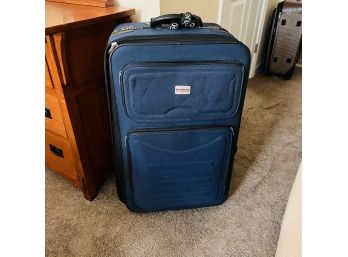 Rugged Cargo Large Rolling Suitcase With Telescoping Handle (Bedroom 2)
