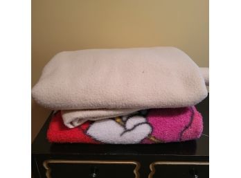 Clown Blanket And Cream Colored Blanket (Upstairs Bedroom)