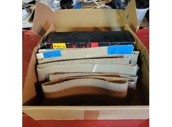 Small Box Of Sanding Belts (Basement)