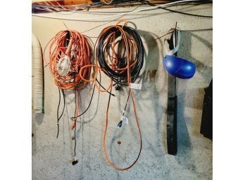 Wall Lot Of Extention Cords, Work Light And Face Shield (Basement)