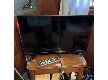 28' Television With Remote And Table Stand (family Room)