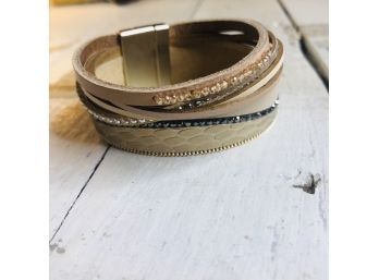 Multi-strand Bracelet In Neutral And Gold Tones