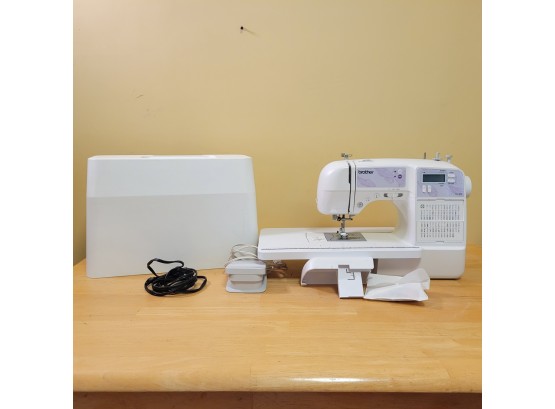 Brother SQ 9000 Feature-Rich Computerized Sewing & Quilting Machine With Removable Tray.