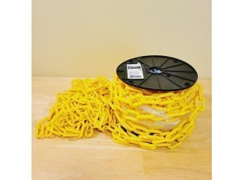 EverBilt Yellow Plastic Chain. Approximately 40 Feet Left On Spool.