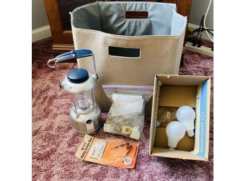 Silver Sylvania Lantern, Various Bulbs, And Findings With Gray Cloth Storage Bin (Livingroom)