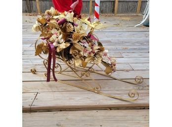 Golden Sleigh With Faux Florals