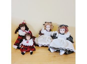 Set Of 4 Delton Miniture Porcelain Dolls