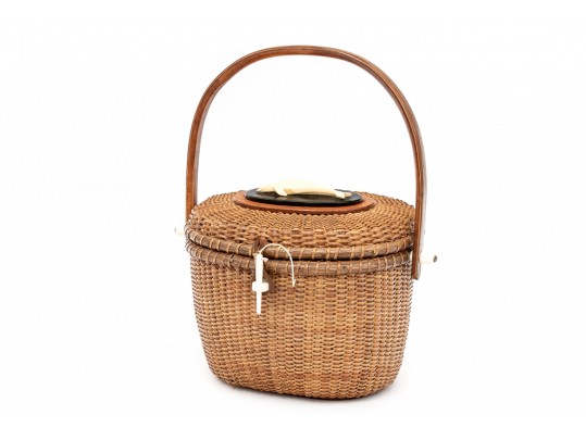 Lot - RARE NANTUCKET BASKET PURSE By José Formoso Reyes. Deep rich patina.  Whale ivory whale-form plaque mounted to top, and whale ivory k...