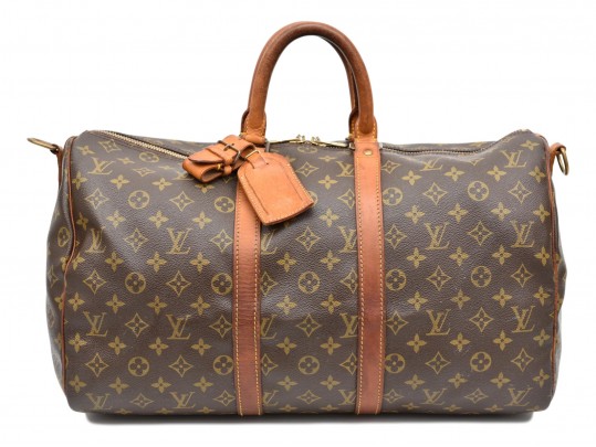 Sold at Auction: Louis Vuitton, A vintage travellers suitcase